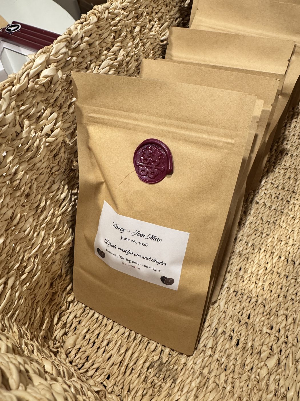 A Folio coffee wedding favor bag with wax seal and hand-lettered label